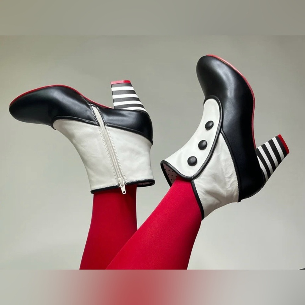 Elegant Black and Cream Heeled Boots